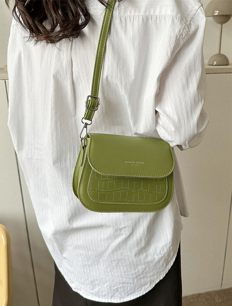 Fashionable textured design crossbody saddle bag