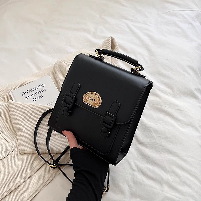 กระเป๋าเป้สะพายหลังแบบมีหัวเข็มขัดสีน้ำตาลสไตล์เรโทรเรียบง่าย / 3 สี
