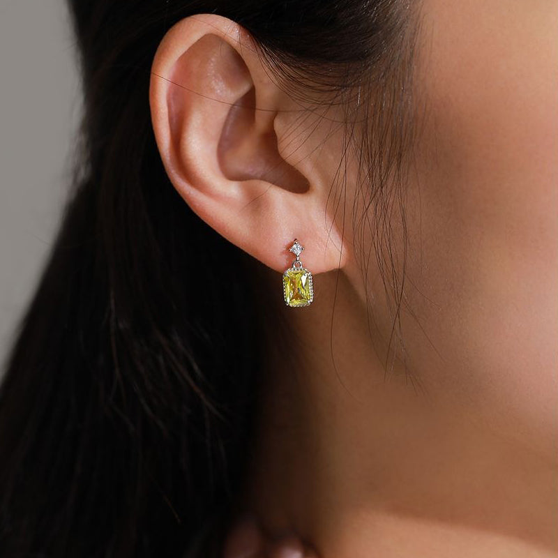 ชุดเครื่องประดับสร้อยคอและต่างหูพร้อมจี้คริสตัลสีเหลืองมะกอกสุดหรู