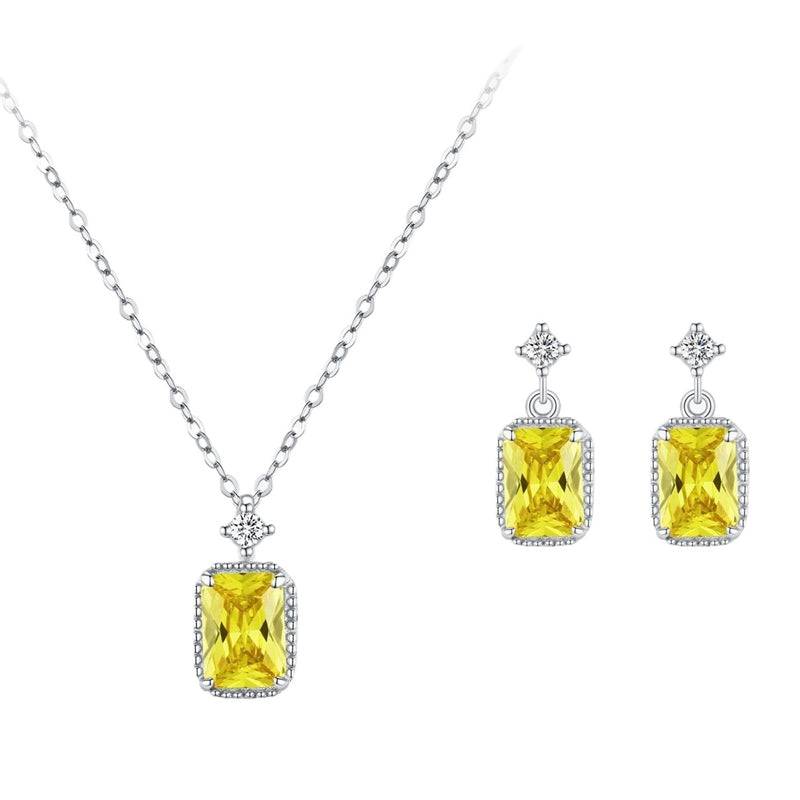 ชุดเครื่องประดับสร้อยคอและต่างหูพร้อมจี้คริสตัลสีเหลืองมะกอกสุดหรู