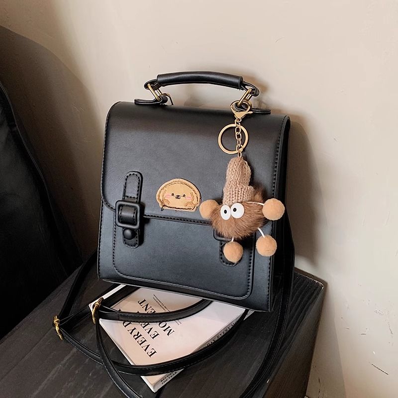 กระเป๋าเป้สะพายหลังแบบมีหัวเข็มขัดสีน้ำตาลสไตล์เรโทรเรียบง่าย / 3 สี