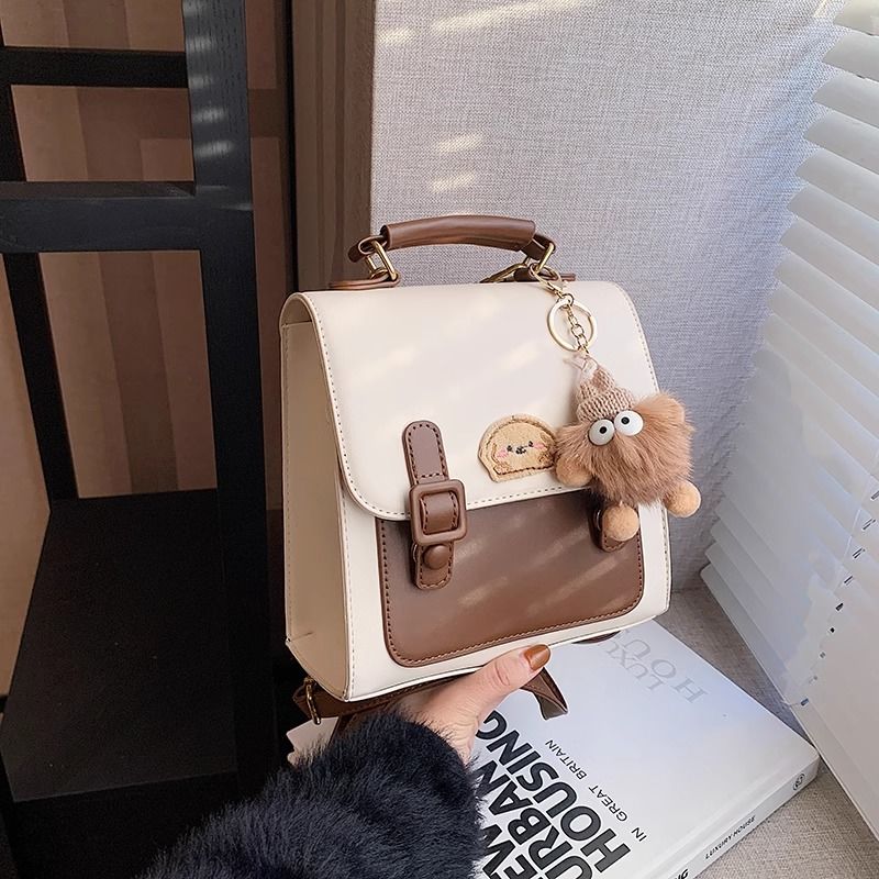 กระเป๋าเป้สะพายหลังแบบมีหัวเข็มขัดสีน้ำตาลสไตล์เรโทรเรียบง่าย / 3 สี