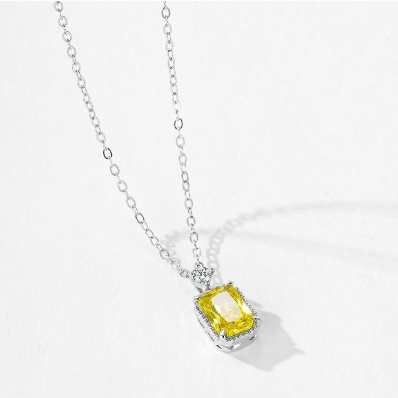 ชุดเครื่องประดับสร้อยคอและต่างหูพร้อมจี้คริสตัลสีเหลืองมะกอกสุดหรู